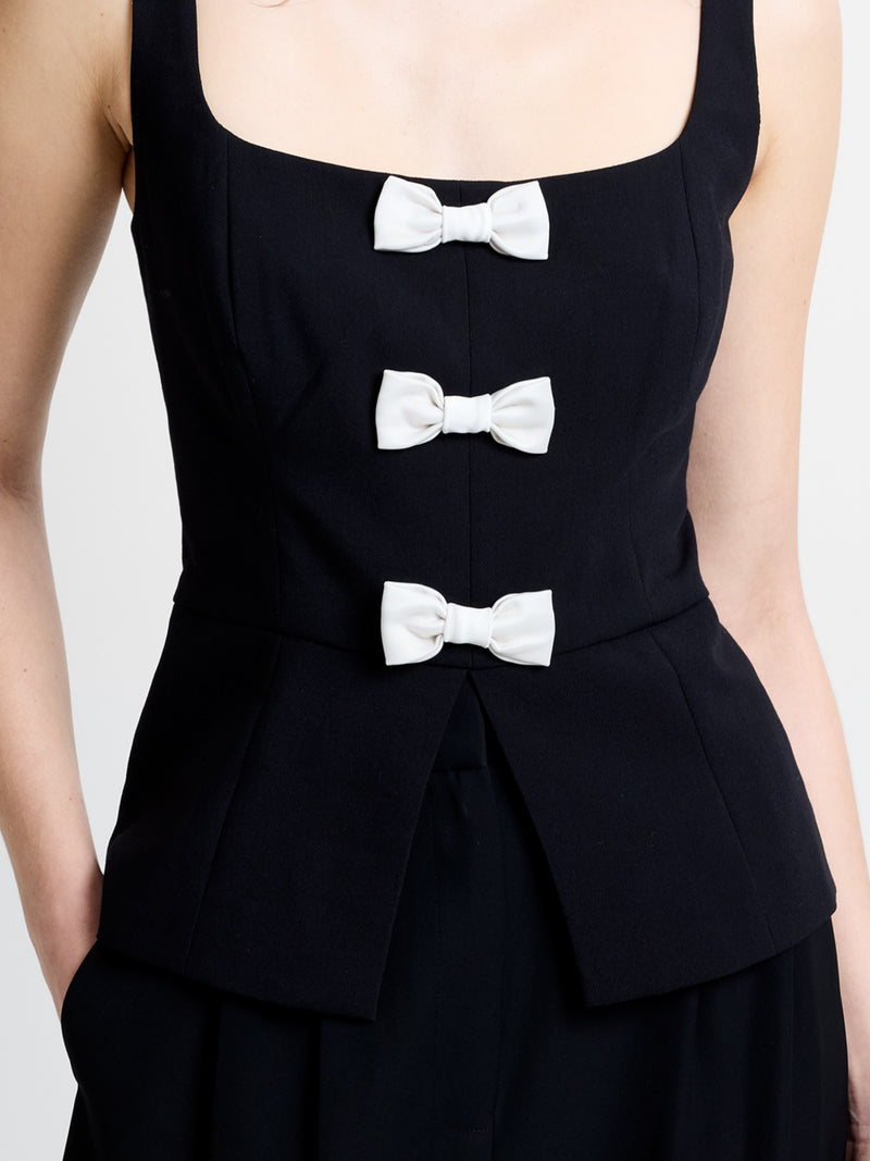 Azra Sleeveless Peplum Bow Top